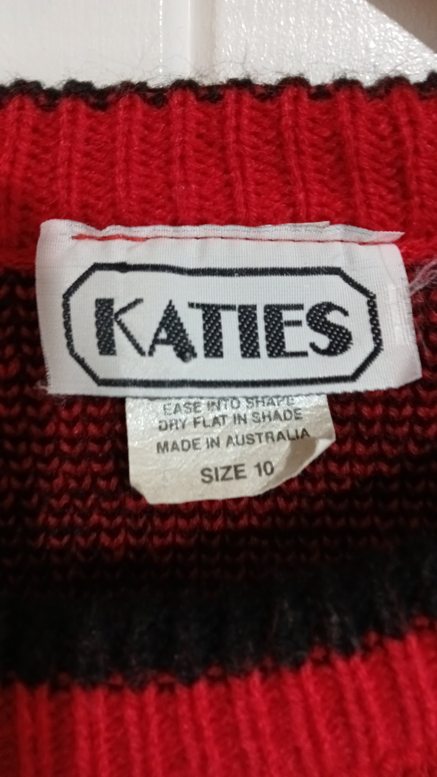 (10) Katies | Red Black Sweater