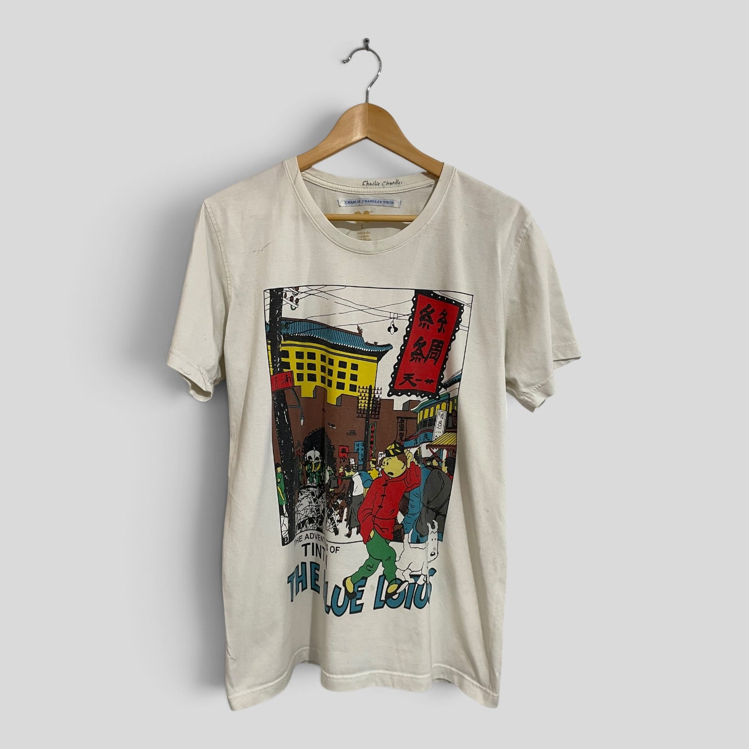 Image of (L) Tin Tin Tee