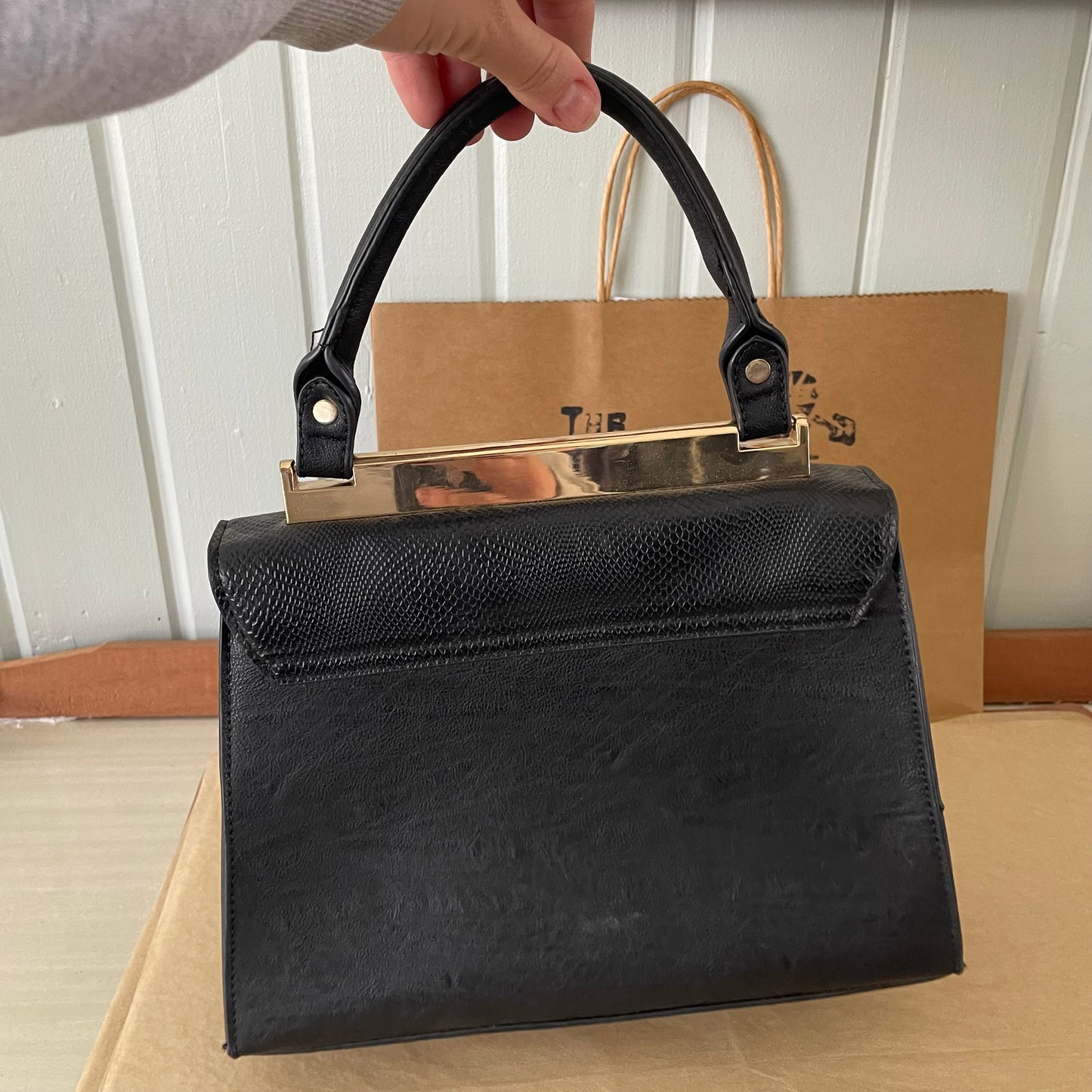 Black Handbag with Gold Trim. Collette Hayman