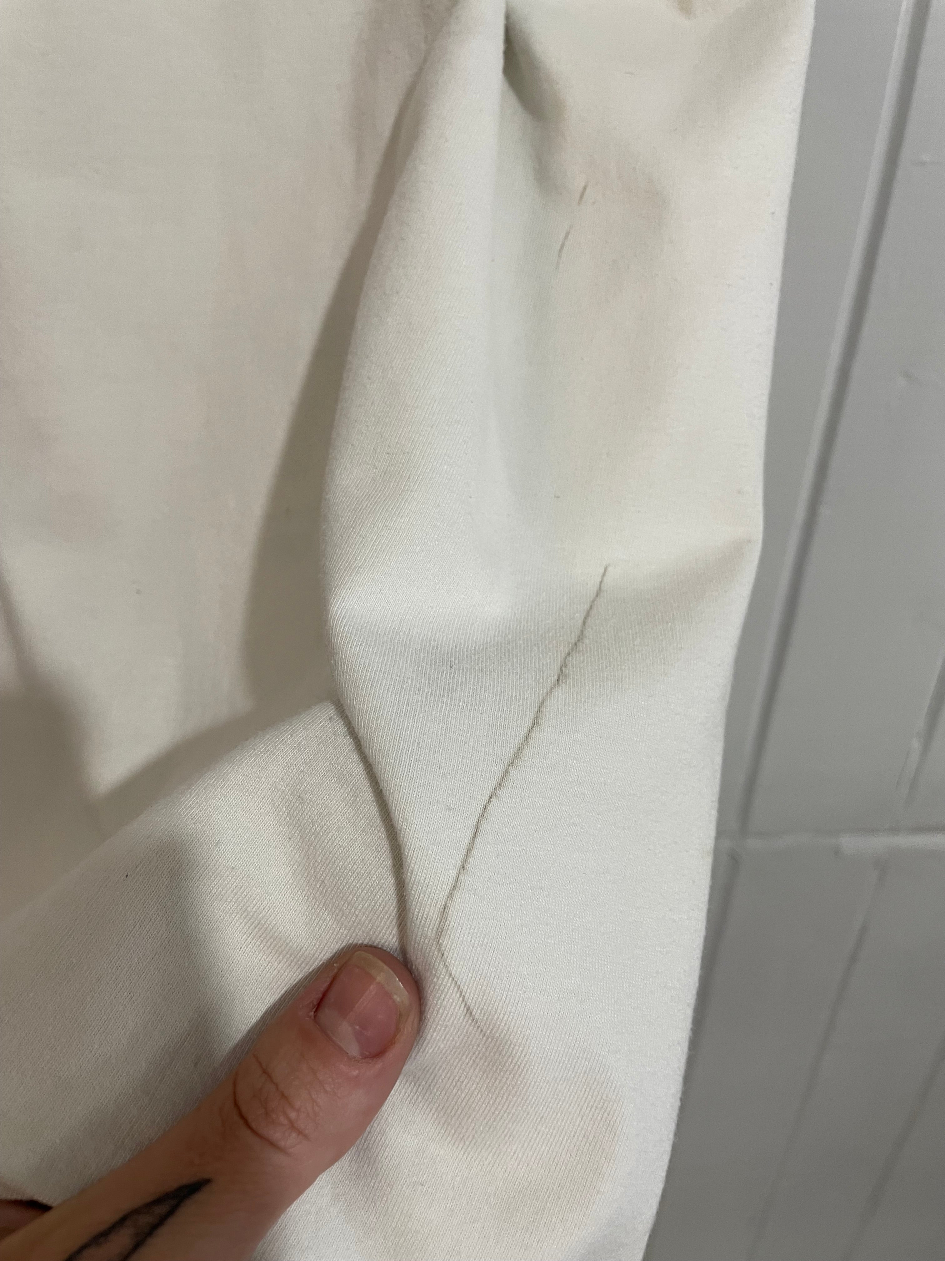Image of (L) Tin Tin Tee