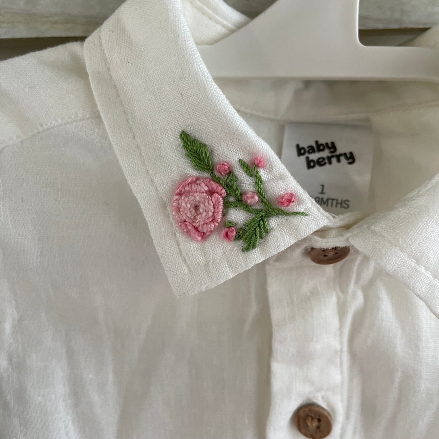 (1) Linen Button Up SS shirt. Floral embroidery on collar