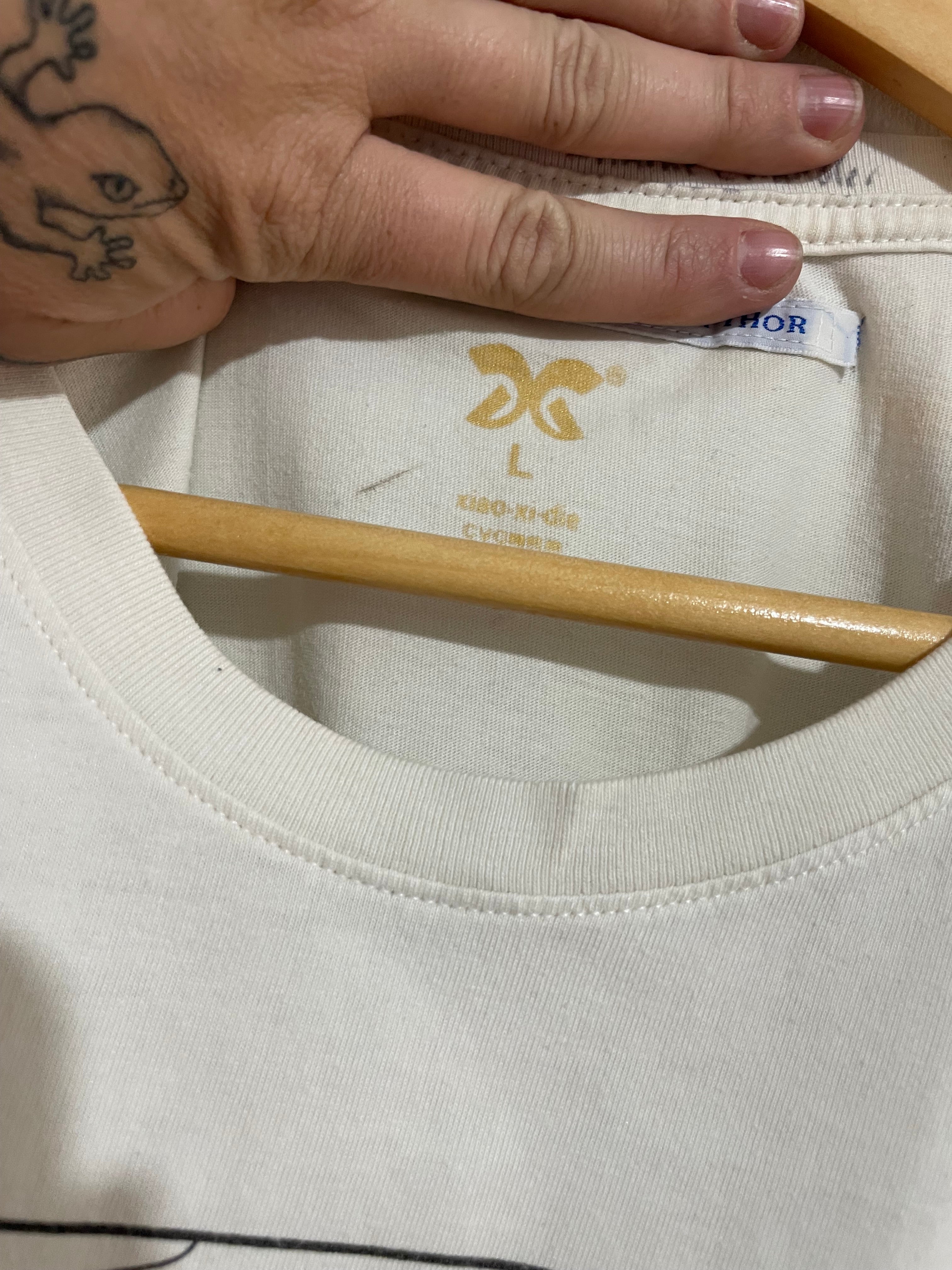 Image of (L) Tin Tin Tee