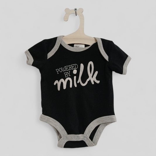 (000JNR) Baby Essentials | Powered By Milk Onesie
